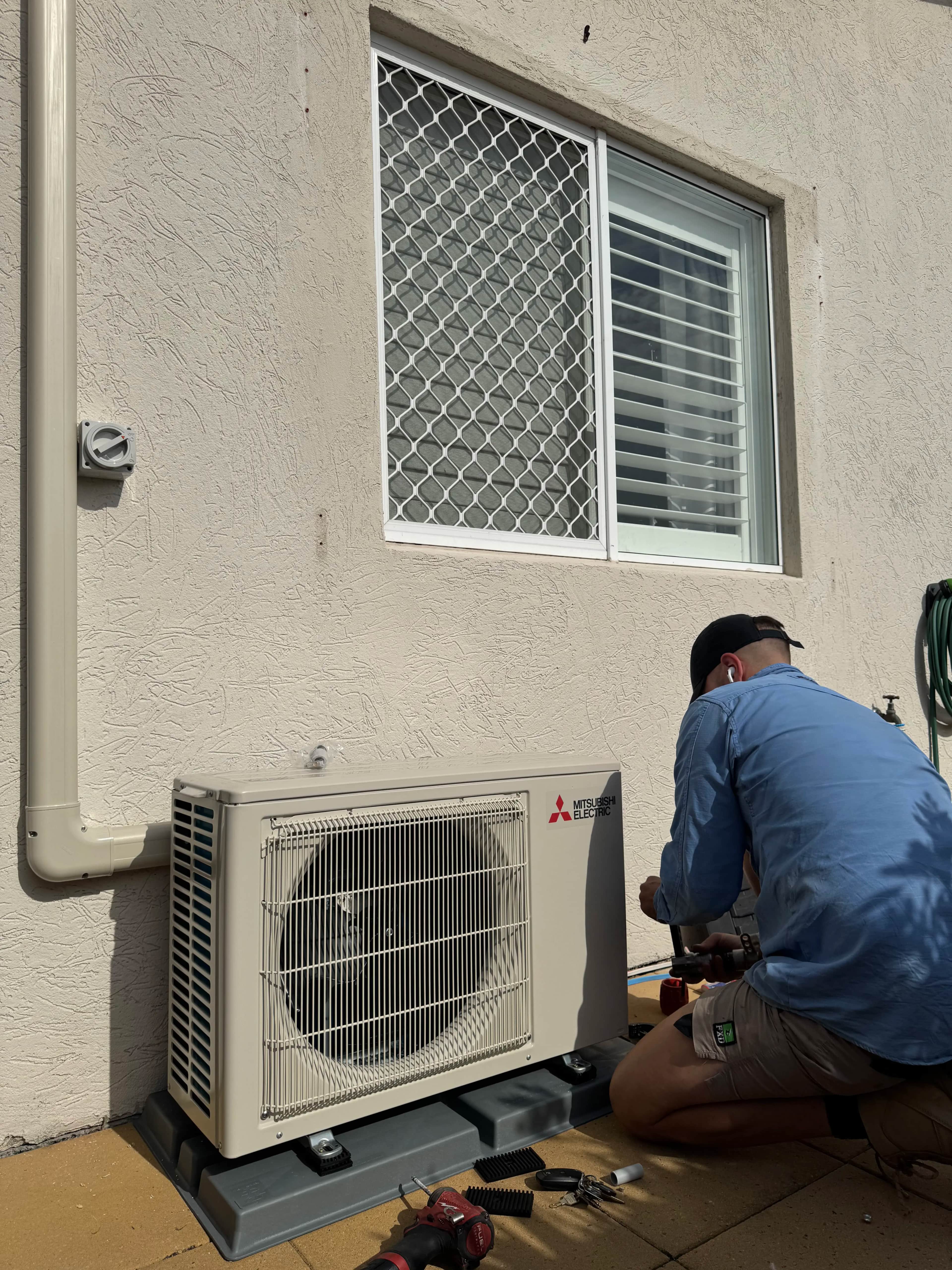 Maintenance check of wall split outdoor unit